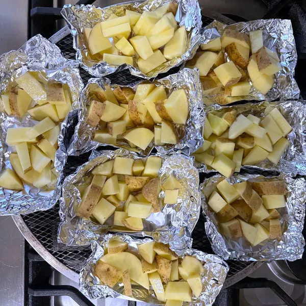 Papas con ajo, horno a 200 °C. Antes de entrar al horno.