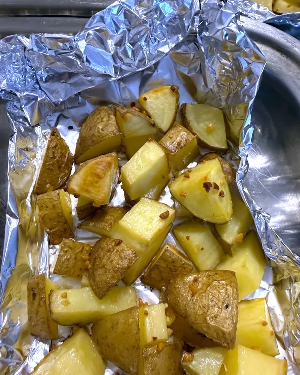 Papas con ajo, horno a 200 °C. Granulado solo.