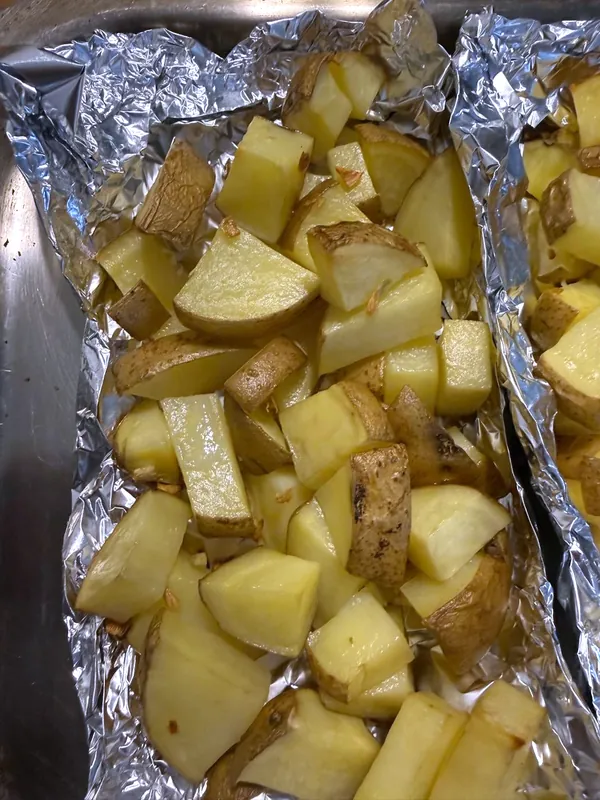 Papas con ajo, horno a 200 °C. Fresco solo.